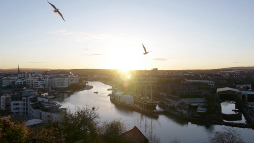 Thumbnail for Bristol - Around the Clock - showing a sunrise over Bristol's Floating Harbour
